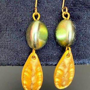 Pierced earrings; gray bead with gold leaf drop